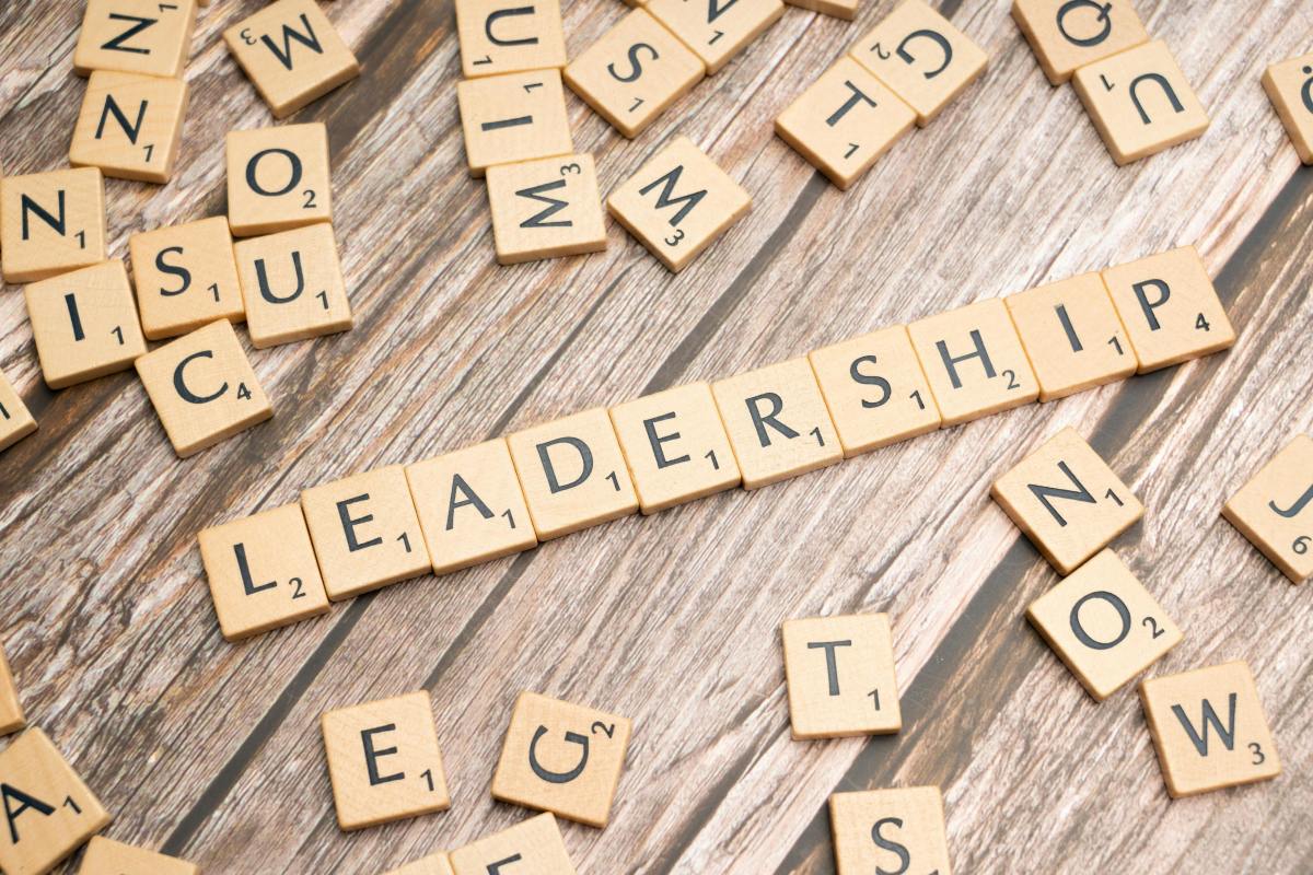 Leadership spelled out using scrabble tiles